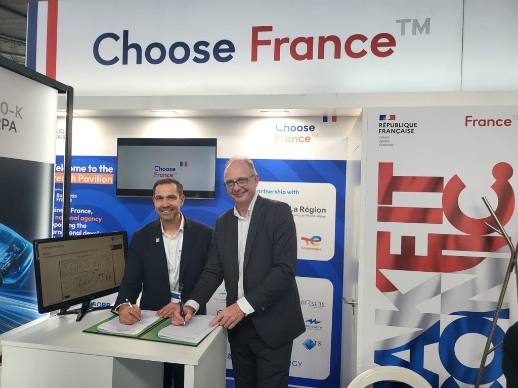 Tiamat representatives at Choose France event, signing a new partnership